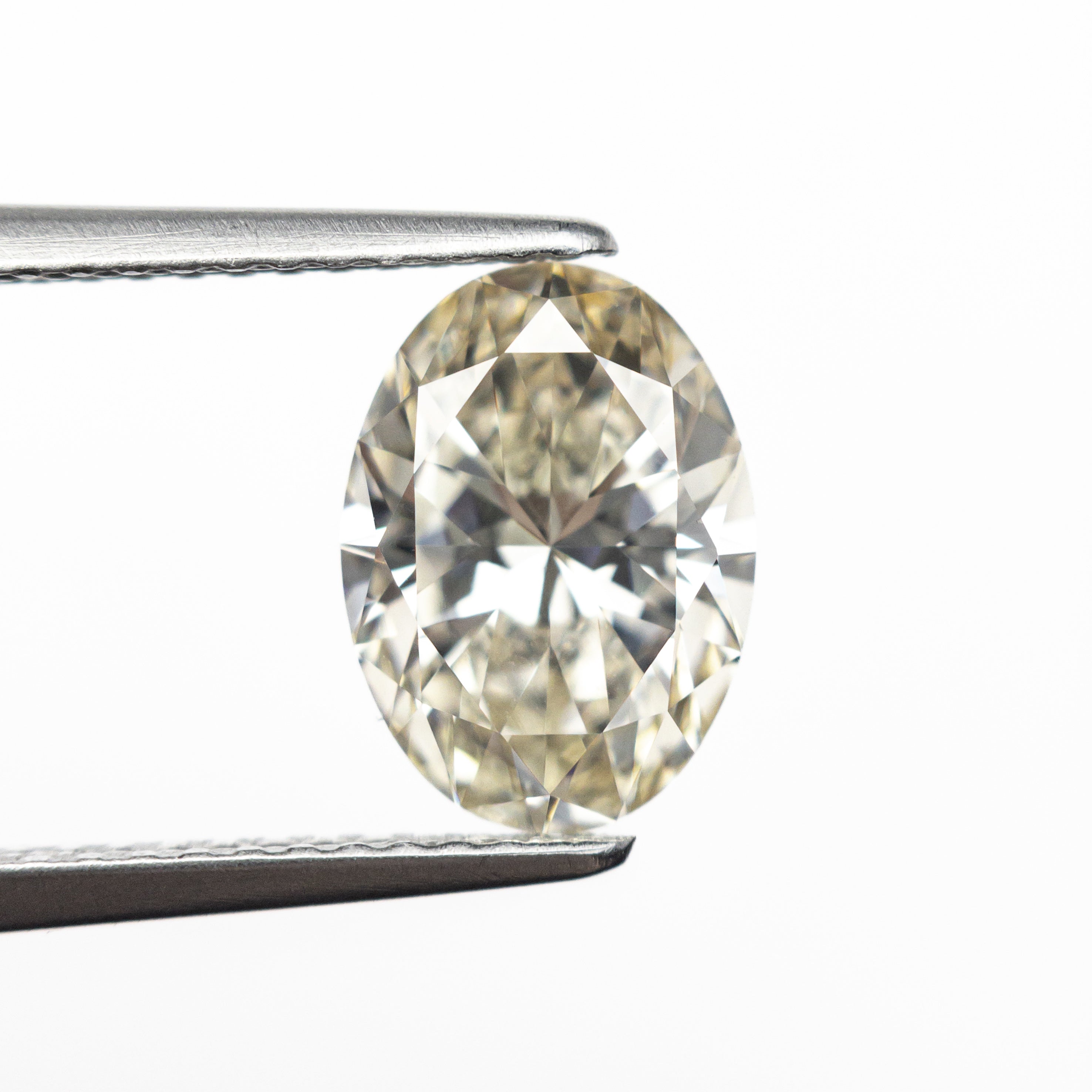 2.02ct 9.74x7.01x4.32mm VS2 M Champagne Oval Brilliant 27365-02