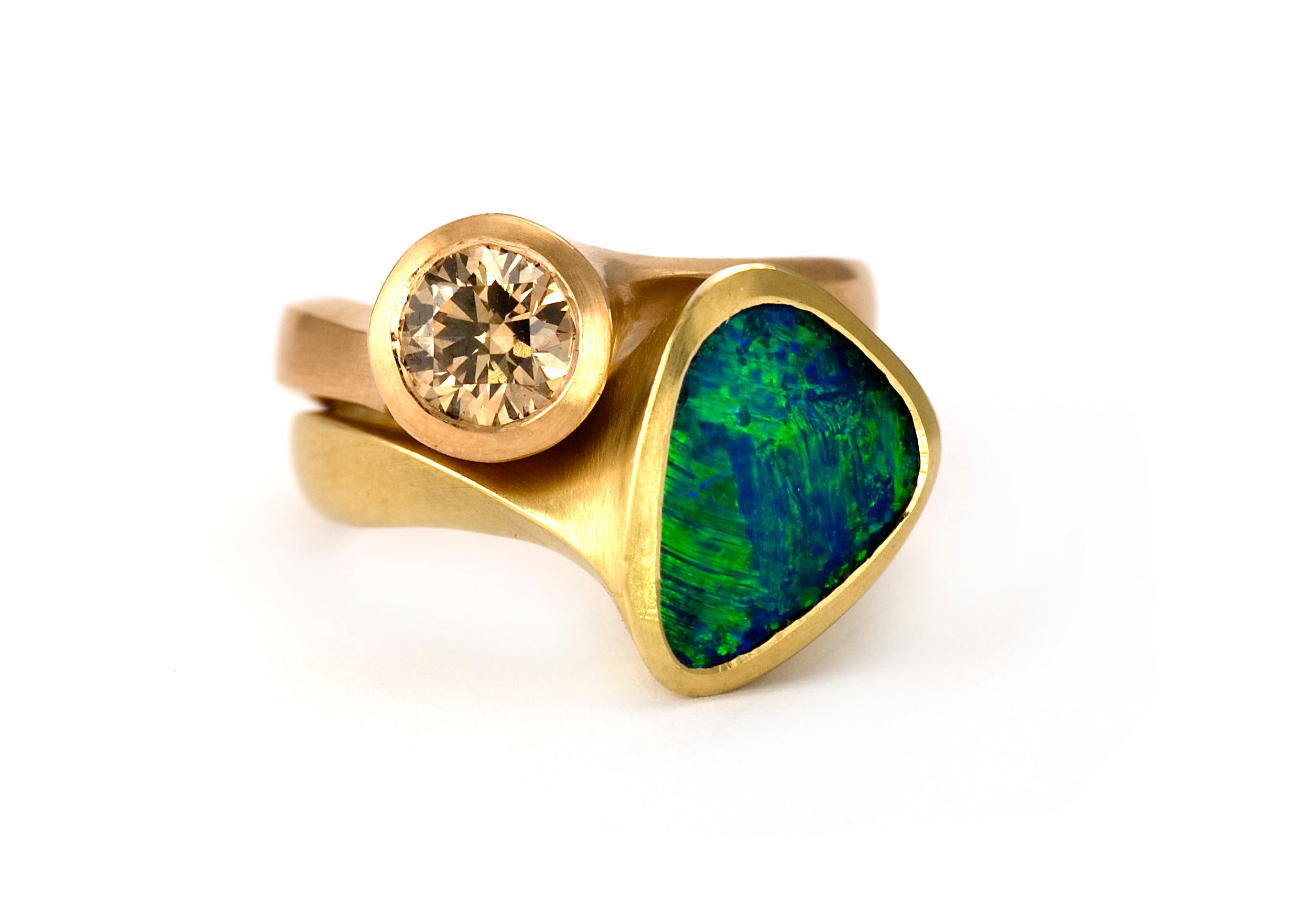 Matching black opal and cognac diamond rings