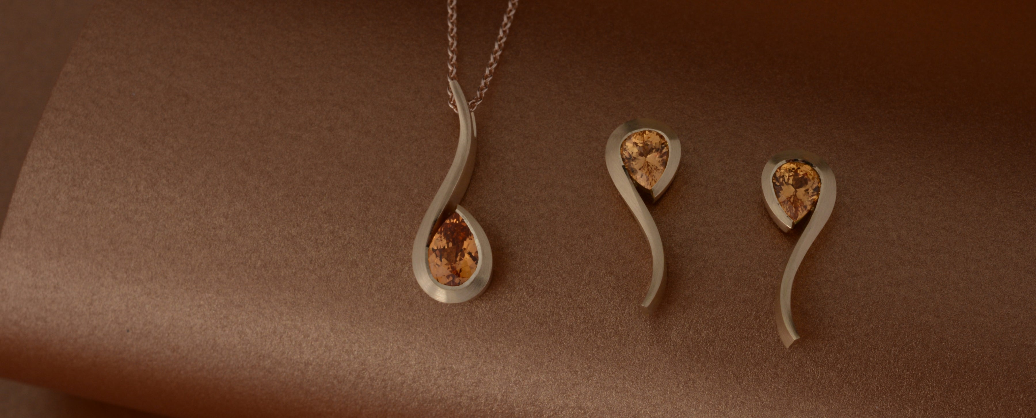 January Garnets in a Twist pendant and earrings