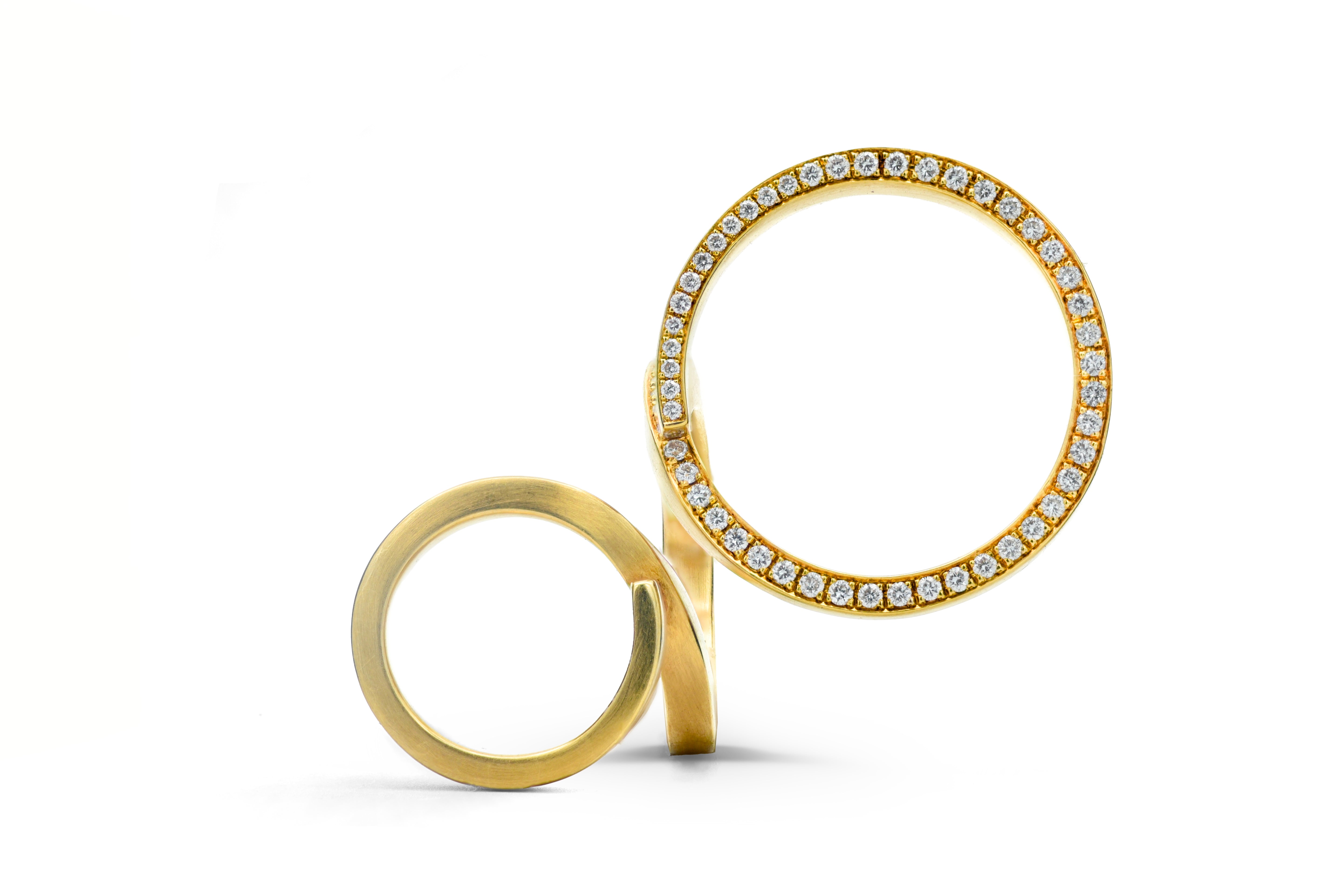 18-carat-forged-gold-pave-diamond ring sitting on its side