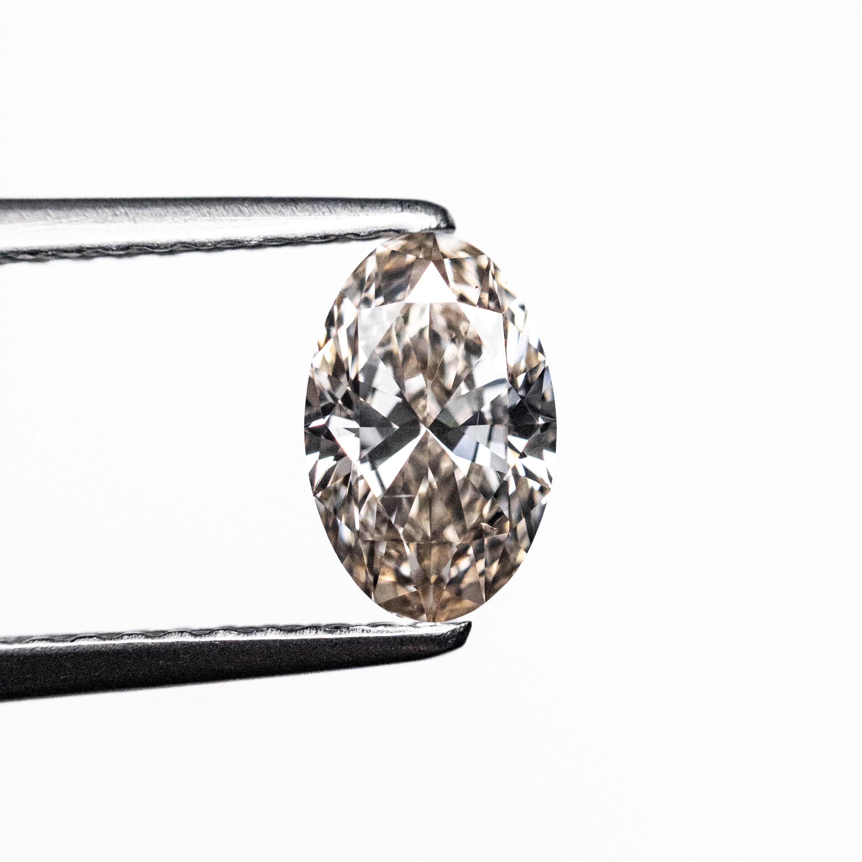 0.71ct 6.96x4.91x3.07mm GIA VS1 M Oval Brilliant 🇨🇦 26597-01