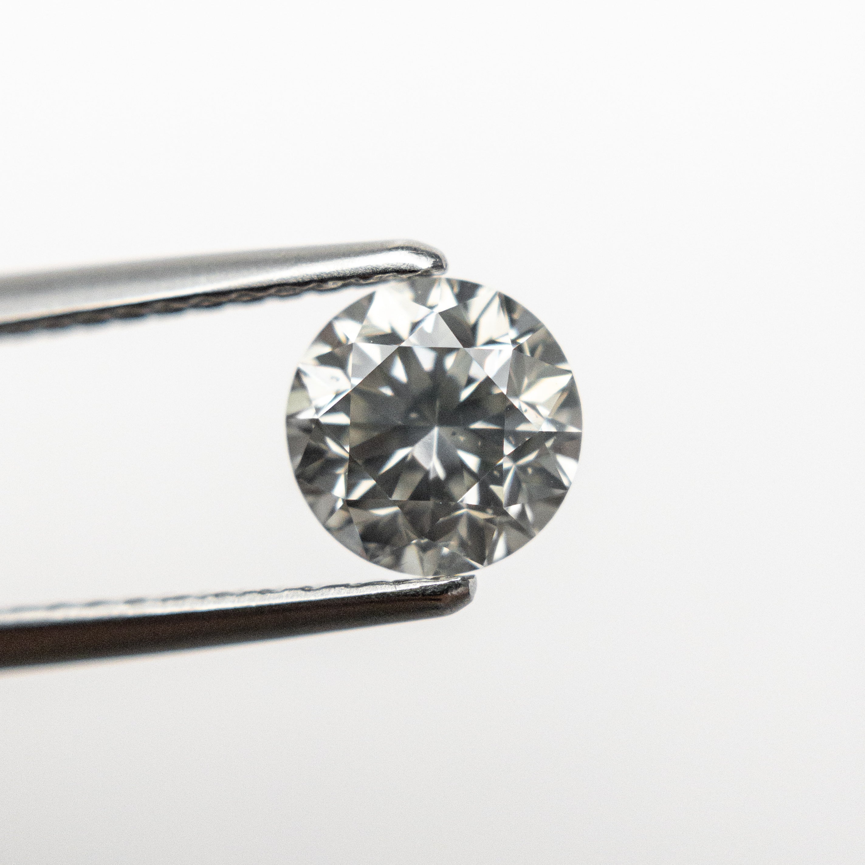 1.01ct 6.06x5.99x4.28mm GIA SI2 Faint Grey Round Brilliant 19001-01 - Misfit Diamonds