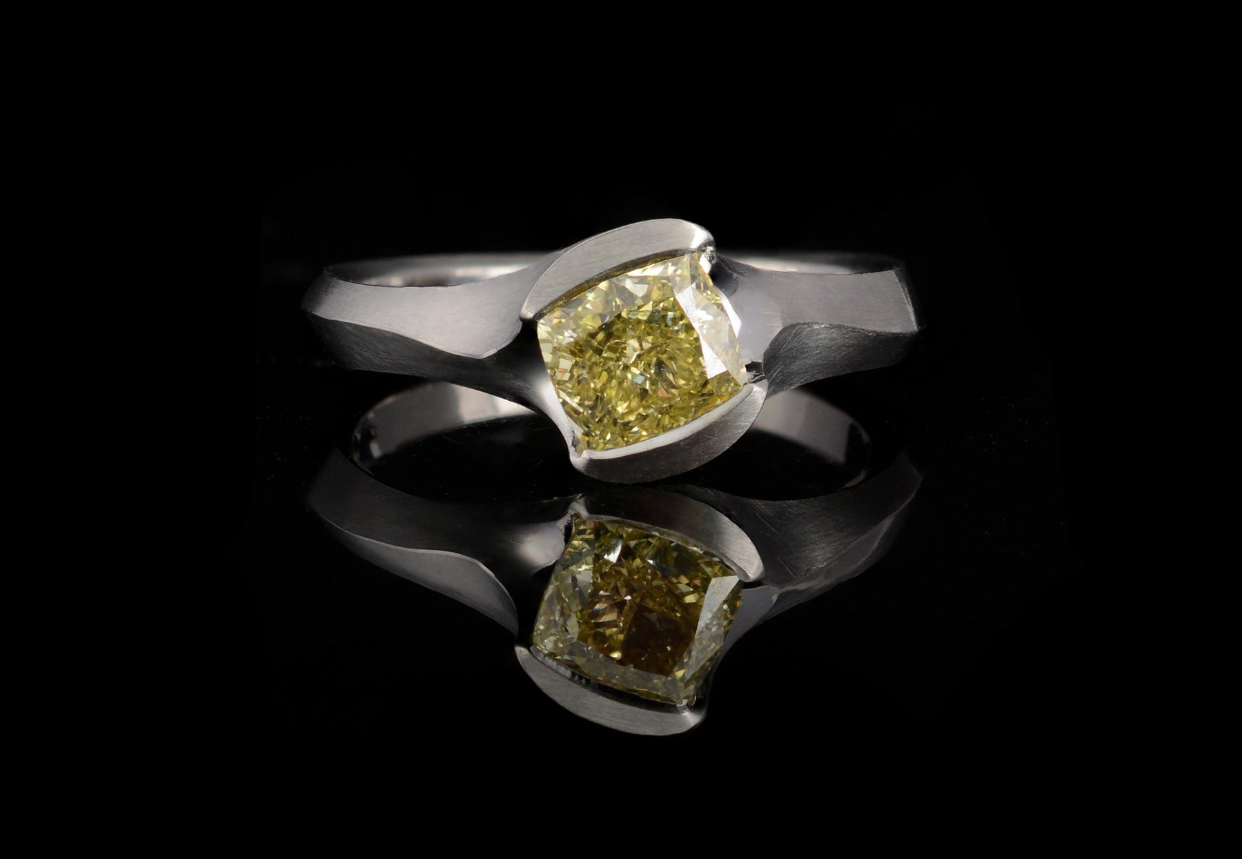 Arris cushion cut yellow diamond and platinum engagement ring