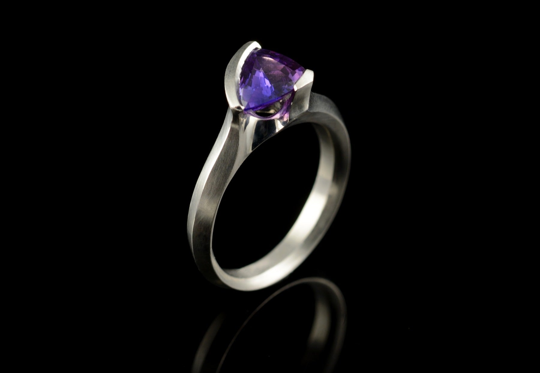 Carved trillion cut purple sapphire platinum ring