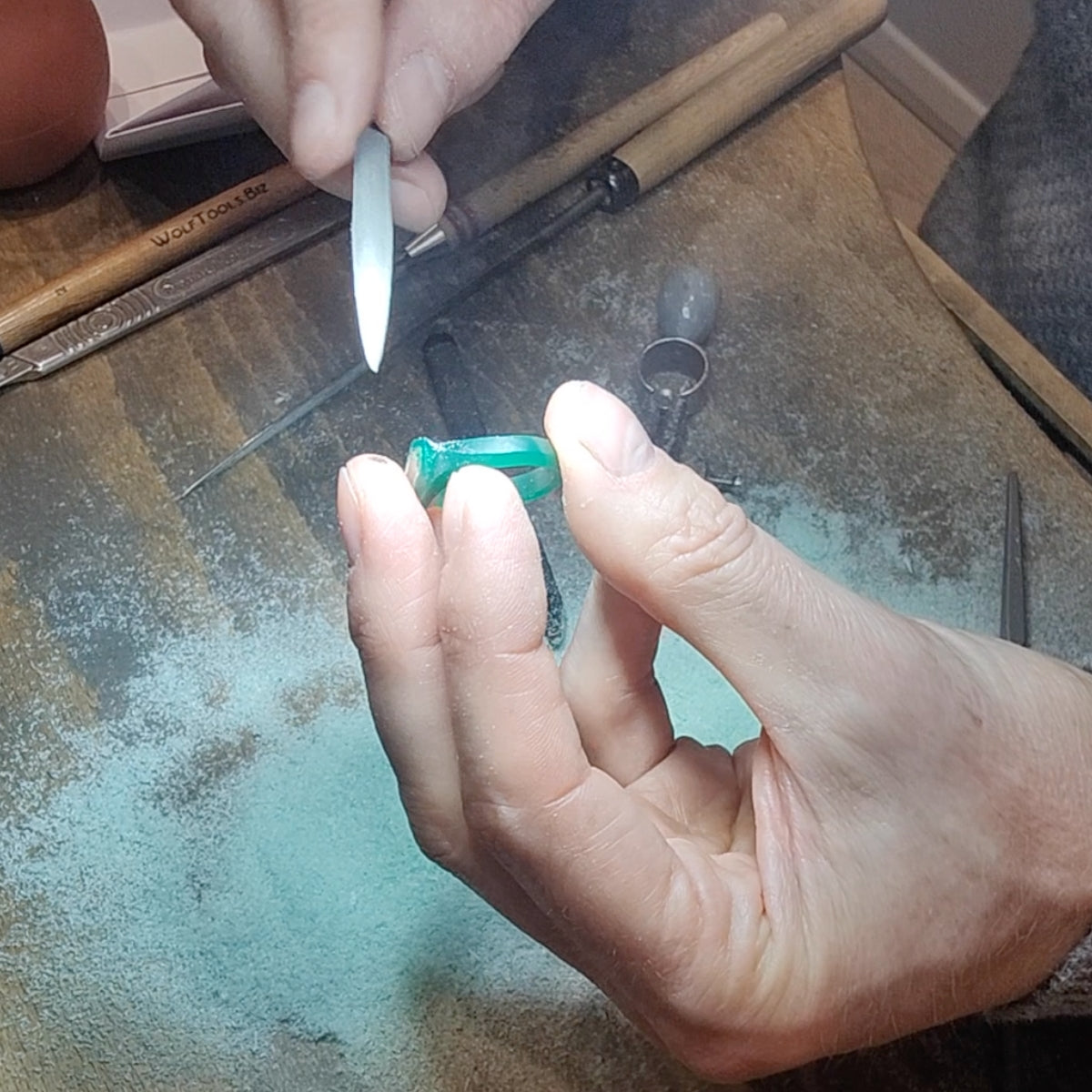 Aegis carving in wax with file