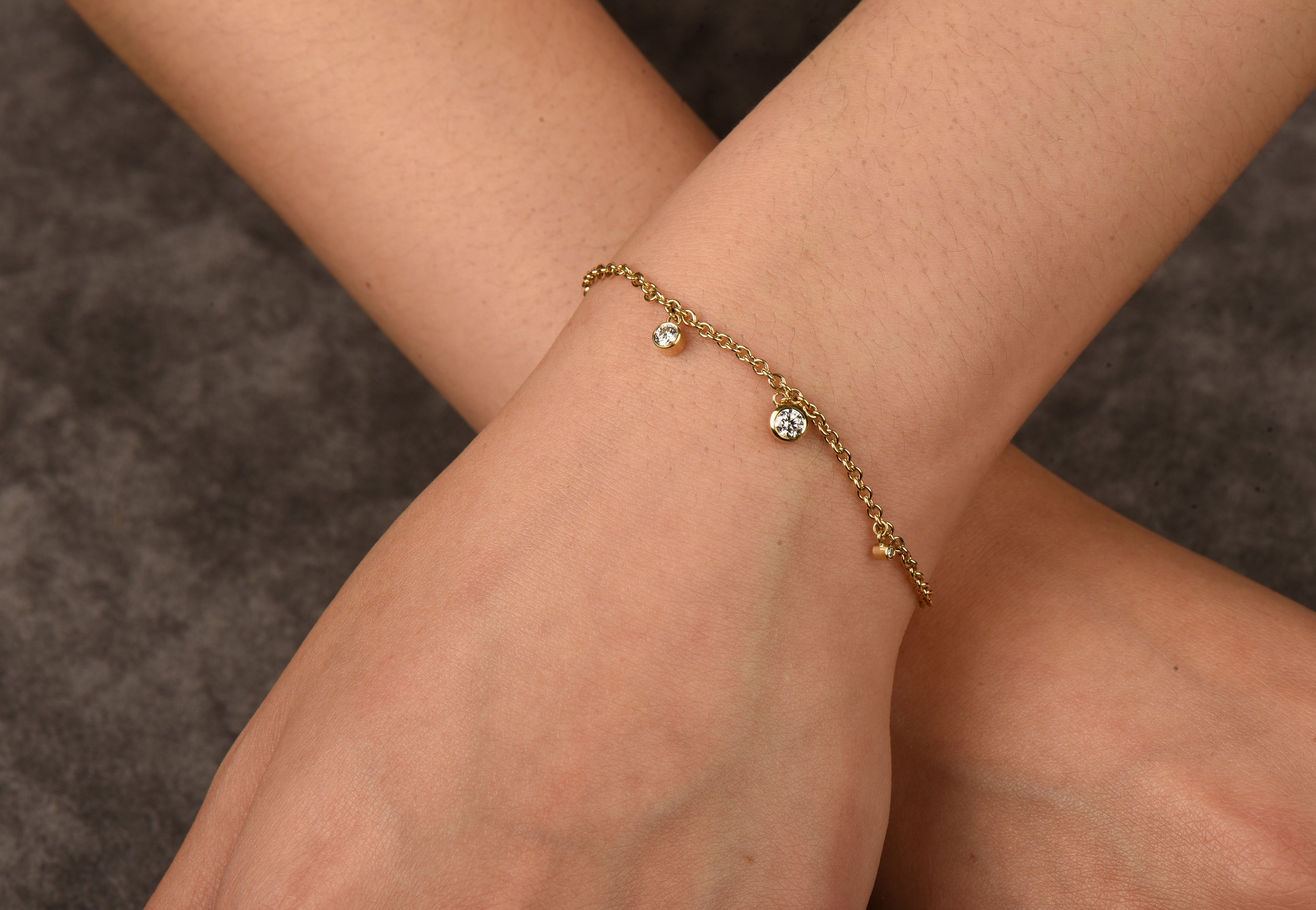 handmade diamond drop bracelet with 3 diamond on 18ct gold chain