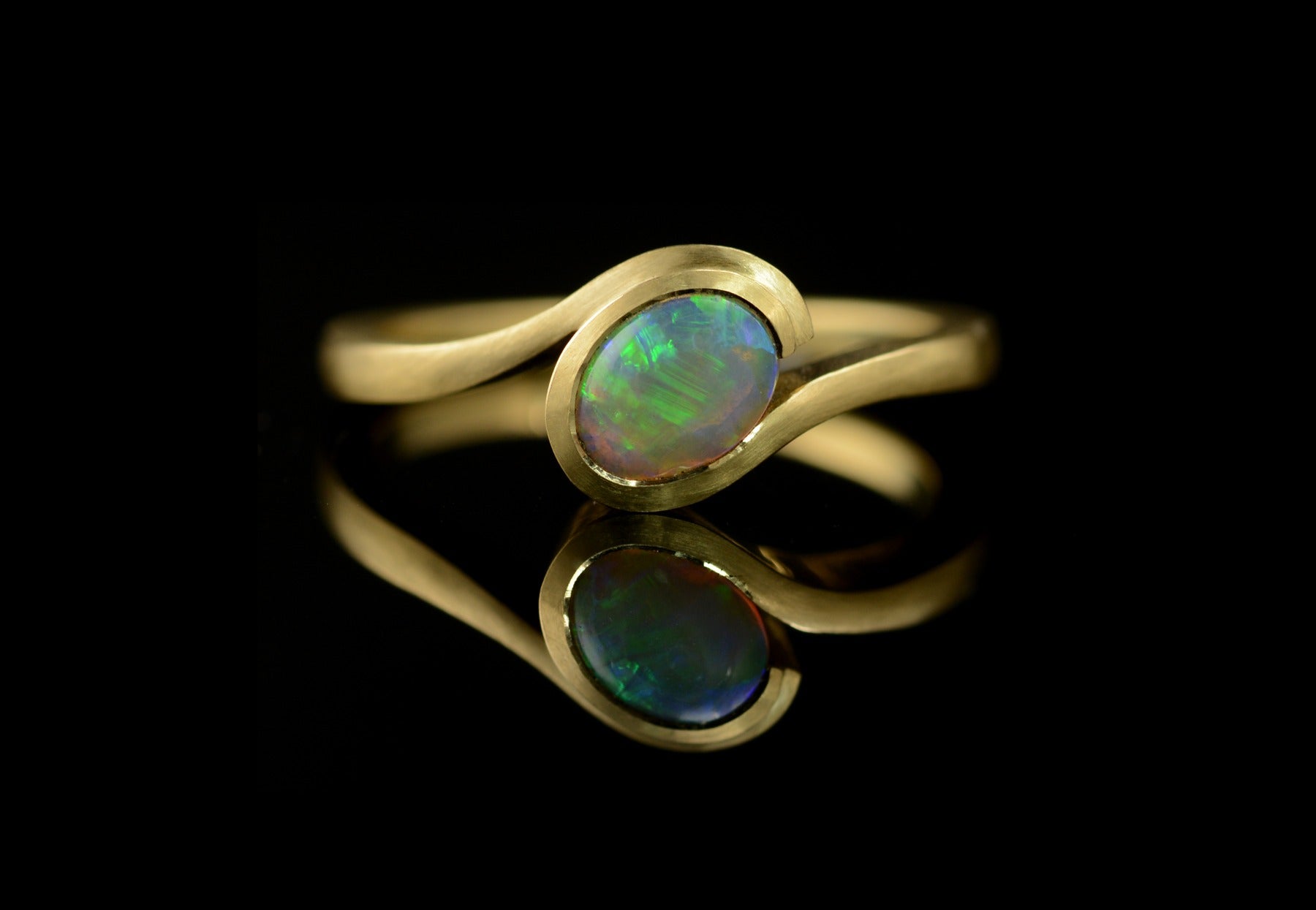 Wave opal yellow gold engagement ring