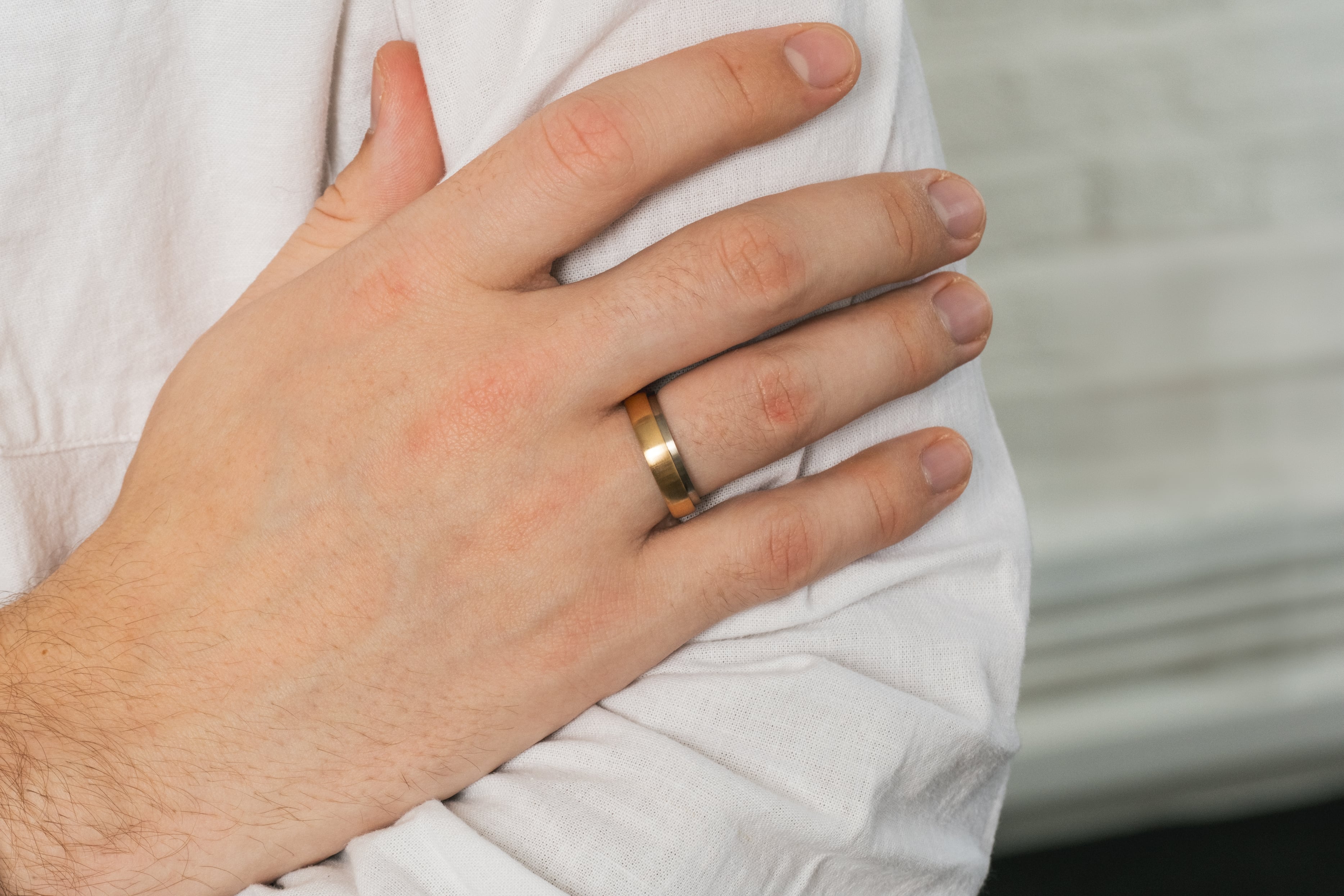 Mixed metal, stepped and sleeved wedding bands.