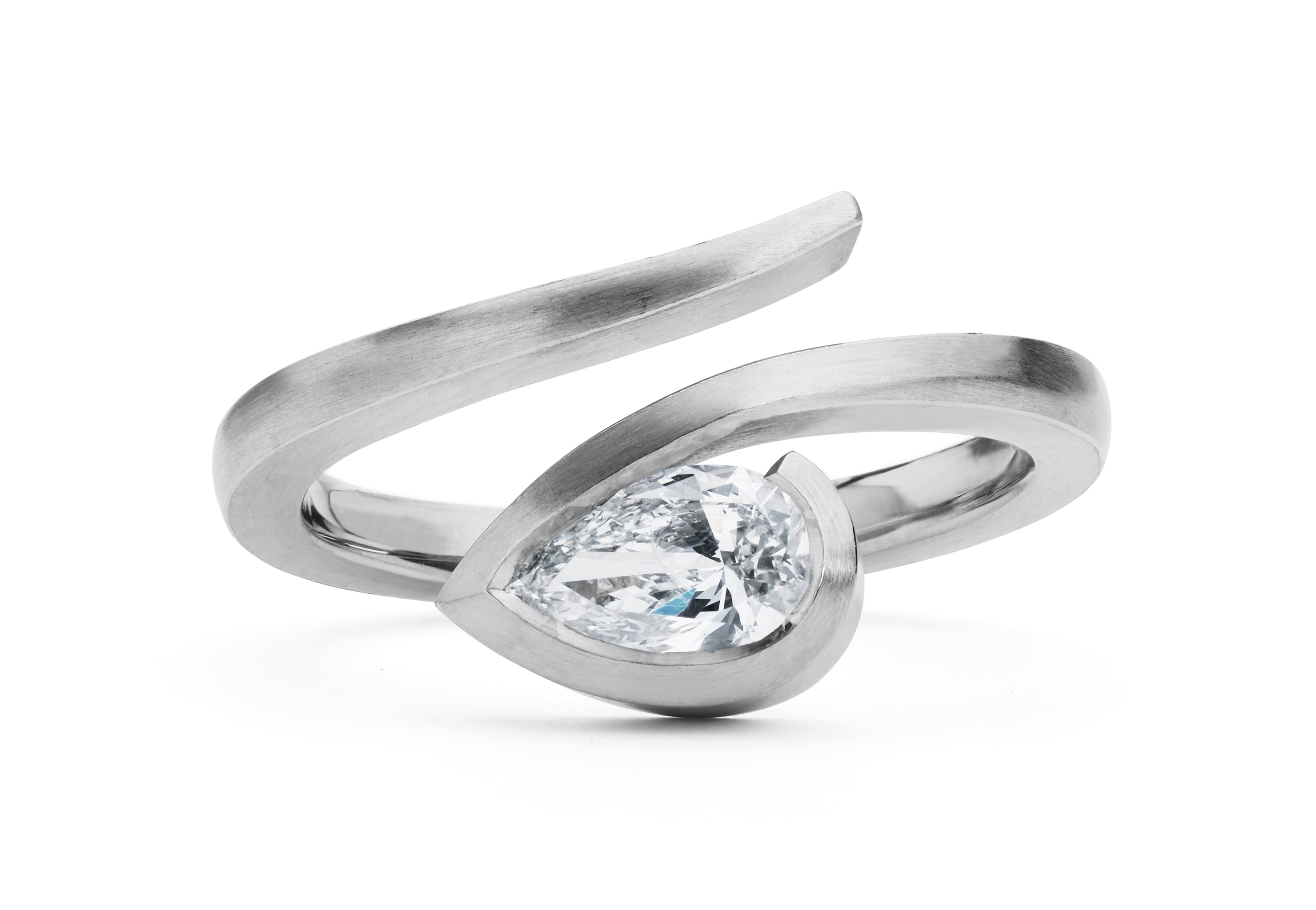 White pear diamond and platinum 'Twist' engagement ring-McCaul